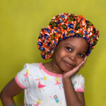 GIRLS ANKARA SILK BONNET/HEADWRAP.
