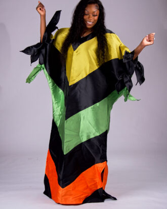 Model wearing The Kaleidoscope color-block boubou in black, yellow, green and orange
