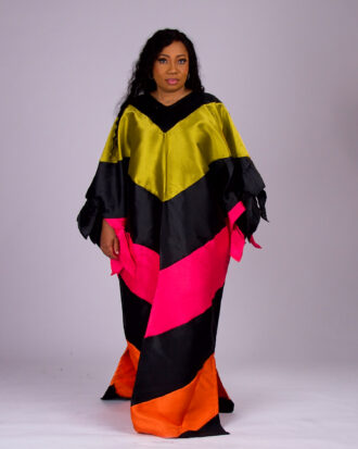 Model wearing The Kaleidoscope color-block boubou in black, yellow, pink and orange