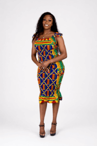 Model wearing the Vibrant Heritage African print smocked midi dress