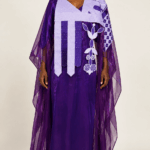 Female model wearing a purple embroidered two-piece boubou